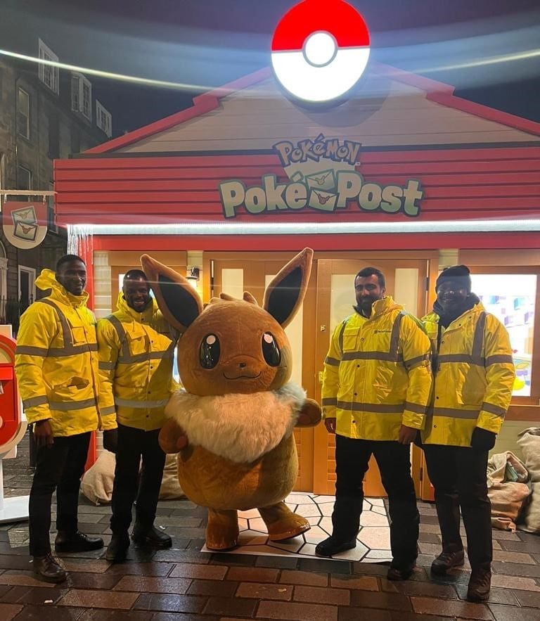 security guards with pokemon characters at a pokestop in edinburgh